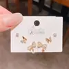 Pendientes Colgantes de Perlas con Lazo de Aguja Plateada Inspirados en el Diseño, Juego de Tres Pares. Pendientes de Lujo Exquisitos y de Alta Gama, Set de 6 Piezas