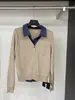 Cárdigan de punto patchwork de mezclilla con solapa para mujer, nuevo estilo primavera/otoño 2026, top de imitación de dos piezas, chaqueta suéter holgada y elegante