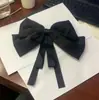 Pinza para el pelo con lazo grande de cinta Estilo coreano Sensación de alta gama Pinza superior para la parte trasera de la cabeza Pinza de resorte Pasador elegante Accesorio para el cabello Al por mayor para mujeres