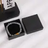 Caja de Joyería Negra de Tapa y Base de Alta Gama al por Mayor en Stock, Caja de Almacenamiento de Anillos de Papel Kraft, Caja de Empaque para Accesorios de Collar