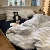 Juego de cuatro piezas a rayas de algodón lavado estilo nórdico minimalista, sábana bajera, sábana encimera, funda de edredón juego de tres piezas para ropa de cama de dormitorio de estudiante
