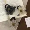 Malla para Cabello Semiatado Clip de Girasol con Pedrería 2025 Nuevo Pasador Parte Trasera de la Cabeza Elegante de Alta Gama Elegante Tocado