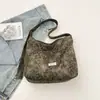 Bolsa Tote Estampa de Leopardo Feminina 2026 Nova Outono Leve Luxo Toque de Alto Padrão Bolsa de Ombro Único Grande Capacidade Bolsa Saco Transversal