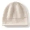 Suave y cómoda, con borde enrollado, gorro de punto de cachemira grueso de color liso, unisex, casual, versátil, cubreorejas, cálido y proporciona protección contra el frío