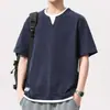 Camiseta de algodón de bambú texturizada de manga corta para hombre, nuevo estilo de verano, camiseta de imitación de dos piezas, corte holgado, cuello de doble capa, top de manga corta para hombre