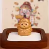 Esculpidas em madeira de cipreste chinês, estas figuras estilo cartoon de "Jornada ao Oeste" de Tang Sanzang, Wukong e Bajie são ornamentos de mesa relaxantes e lembranças culturais e criativas de áreas cênicas.
