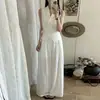 Conjunto de Verano Estilo Coreano con un Diseño Elegante Estilo Francés, Top sin Mangas de Color Sólido con Diseño de Botones Diagonales + Conjunto de Pantalones Anchos Adelgazantes