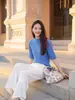 Suéter casual de lana para principios de otoño 2026, suéter nuevo y elegante de manga media para mujer Puyuan, hilo Yangzi, lavable a máquina, directo del fabricante