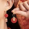 Pendientes de Año Nuevo con carácter FU rojo y petardos, pendientes de lujo ligero de alto grado con temperamento para mujer, pendientes de temperamento nuevos y únicos de otoño e invierno