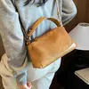 Bolso Cruzado de Gamuza Flocado Hombro Único Estilo para Viajar Bolso de Mano Patchwork de Nicho Otoño Versátil Estilo Nuevo Mujer 2026 Retro