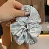 Novidade Primavera e Verão 2025 Argola de Cabelo com Contas Plissadas para Unha Círculo Intestinal de Tecido Design de Nicho Estilo Francês Cordão de Cabeça Bola para Amarrar Acessórios de Cabelo para Mulheres