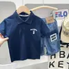 Ropa de Verano para Niños Nuevo Estilo Camisa Polo Camiseta de Manga Corta para Niños 2026 Moderna Camiseta Suave para Niños Mayores Camiseta Básica Moderna