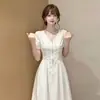 Vestido blanco de manga corta con cuello estilo francés para mujer, nuevo modelo de verano, entallado en la cintura, adelgazante, vestido largo, transparente y que se ajusta a la figura