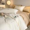 Classe A 100s Xinjiang algodão de fibra longa algodão conjunto de quatro peças leve luxo bordado estilo simples algodão roupa de cama para mães e crianças