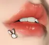 Uña de labio con diente interno de acero inoxidable de conejo, gota de aceite para uñas, caricatura simple, uña de cartílago del oído 1.2 nueva joyería de perforación corporal humana al por mayor
