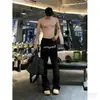 Calça casual moderna estilo americano para homens, fashion e versátil, design retrô, efeito emagrecedor, casual e esportiva, calça comprida de cor sólida