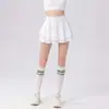 Conjunto de Tenis para Mujer de Manga Corta con Bloques de Color y Cuello Polo Acanalado, Falda de Tenis Antiexposición, Secado Rápido y Transpirable