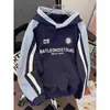 Sudadera con capucha a rayas de bloques de color de estilo universitario de moda transfronteriza para hombres y mujeres, prenda exterior casual retro americana extragrande y resistente