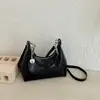 Bolsas de mano vintage para primavera y verano 2026 nuevas bolsas para mujer de uso diario populares bolsos cruzados de un solo hombro bolsos de axila bolsos de empanada
