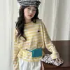 Conjunto de Dos Piezas para Niñas con Mangas Largas Rayadas Estilo Coreano para Protección Solar + Shorts, Nueva Moda Infantil Tendencia Verano 2026