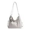 2026 Nova Moda Casual Estilosa Simples Personalidade Design Bolsa Tote Feminina Tendência Grande Capacidade Mochila para o Dia a Dia