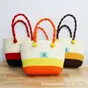 Caja de regalo de cuerda de algodón con bloques de color creativos para vacaciones infantiles, un regalo de almacenamiento genial para el verano con un toque de alta gama