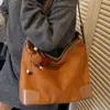 Bolso Cubo al por Mayor Estilo Nuevo 2025 Moderno Sencillo de Gama Alta Estilo Extranjero Gran Capacidad Bolso Versátil para Mujer Bolso de Mano con Estampado de Leopardo