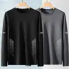 Temporada de primavera y otoño, camiseta lisa de manga larga popular, corte holgado, cuello redondo, camiseta interior para hombre, top simple y versátil