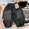 Pantalón vaquero de una pieza de forro polar para niño para otoño e invierno 2026, nuevos pantalones holgados de estilo coreano para niños, pantalones largos suaves para bebés y niños pequeños