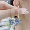 Aretes de amor de diamantes completos súper brillantes azules 2024 nuevos aretes de alto sentido temperamento de Corea del Sur aretes de corazón de red