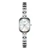 Reloj de mujer estilo Gedi con nácar, reloj de pulsera de aleación de alto valor de nicho, reloj de cuarzo compacto