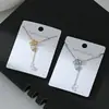 Cadena Elegante para Clavícula Bañada en Oro Real con Circonitas Microincrustadas para Mujer, Collar de Cadena con Colgante de Corazón y Borla de Diseño Exclusivo, Cadena de Suéter de Lujo Ligero