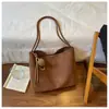 Bolso de madre e hijo de nicho coreano transfronterizo para madres que van al trabajo, bolso de mujer nuevo, elegante, retro, de gran capacidad, bolso tote, bolso de hombro casual