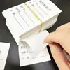 En stock impermeable y a prueba de aceite cordón de tela sintética escrito a mano etiqueta de identificación de tarjeta de identificación etiqueta de tarjeta de flujo de producto