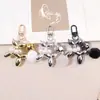 Nuevo Colgante para Llavero de Perro de Perla Electrochapada Colgante de Perro Burbuja para Bolso Cubierta de Auriculares Llavero Regalo