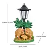 Novas luzes de jardim movidas a energia solar transfronteiriças, apresentando designs de dinossauros jurássicos, incluindo T-Rex e Triceratops, para decoração de jardim e como pequenos enfeites