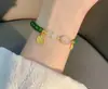 Novedad Pulsera con Colgante de Borla y Hebilla de Seguridad de Perlas Redondas Esmeralda que Realzan el Blanco para Mujer