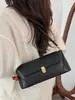 Bolso de axila texturizado casual retro para mujer 2025 nuevo de verano bolso de hombro de nicho francés bolso baguette de moda