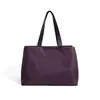 Bolsa de Moda de Luxo 2026 Nylon Leve Grande Capacidade Unissex Simples Compartimento de Viagem Bolsa de Mão Mesmo Estilo