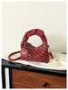 Otoño 2026 Nuevo Estilo Coreano Bolso Cubo de Lunares Bolso de Mano para Mujer Alta Apariencia Bolso Cruzado de un Solo Hombro Moda Pequeño Bolso para Viajes