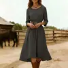Nuevo vestido de algodón y lino de color liso, cuello redondo, manga larga, entallado a la cintura, estilo cruzado europeo y americano para mujer, longitud media, estilo casual de vacaciones, azul