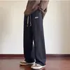 Pantalones casuales rectos con dobladillo tridimensional de rejilla de piña para hombre, marca de moda de otoño, pantalones deportivos holgados versátiles de pierna ancha y caída suave