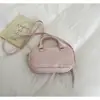 Bolso de mano Ganbo Boston 2026 primavera/verano nuevo, bolso cruzado casual versátil, bolso tipo bowling dorado