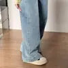 Jeans retro americanos desgastados de dobladillo curvo para mujer, nuevo modelo 2026, de cintura alta, adelgazantes, elegantes, pantalones holgados de pierna ancha