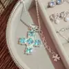 Collar de cruz de cubo de azúcar de circón inspirado en el estilo ins coreano, lujo ligero con un toque de alta gama, cadena para la clavícula con un diseño de nicho, cadena para suéter