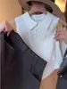 Top de punto blanco estilo francés, suave y cómodo, con cuello polo, para mujer, Verano 2026, Blusa sin mangas abotonada y transpirable