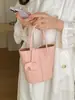 Bolso de mano minimalista de moda transfronterizo para mujer, nuevo bolso cubo de hombro elegante y moderno, bolso cruzado versátil