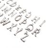 Colgante pequeño de acero inoxidable con 26 letras transfronterizo, etiqueta de letra con forma especial para presión de aceite, accesorios DIY al por mayor