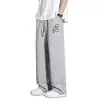 Pantalones de chándal nuevos, modernos, divertidos y estampados para primavera y verano, pantalones casuales rectos finos, pantalones anchos sueltos y fluidos