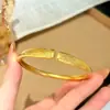 Joyería chapada en oro Nuevo estilo chino esmalte pintado pavo real pulsera abrible Color duradero Dragón y fénix luz auspiciosa pulsera versátil de lujo